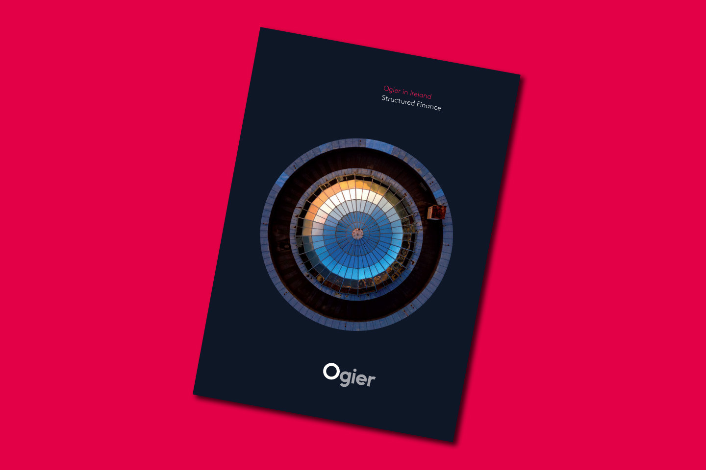 Ogier Ireland Structured Finance brochure cover featuring circular architectural design in blue and gold tones with Ogier branding