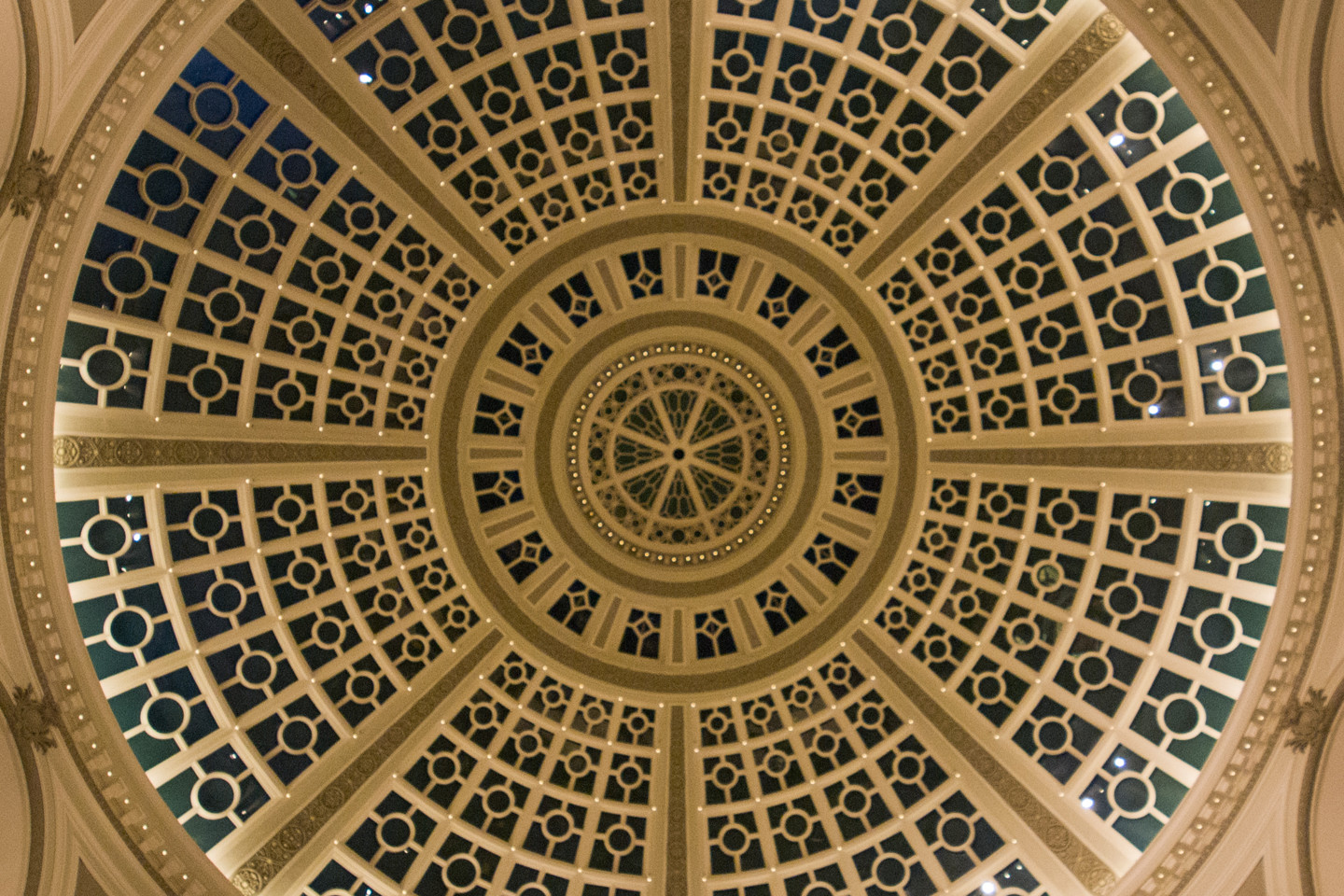 Intricately designed skylight in ceiling of dome shaped building 