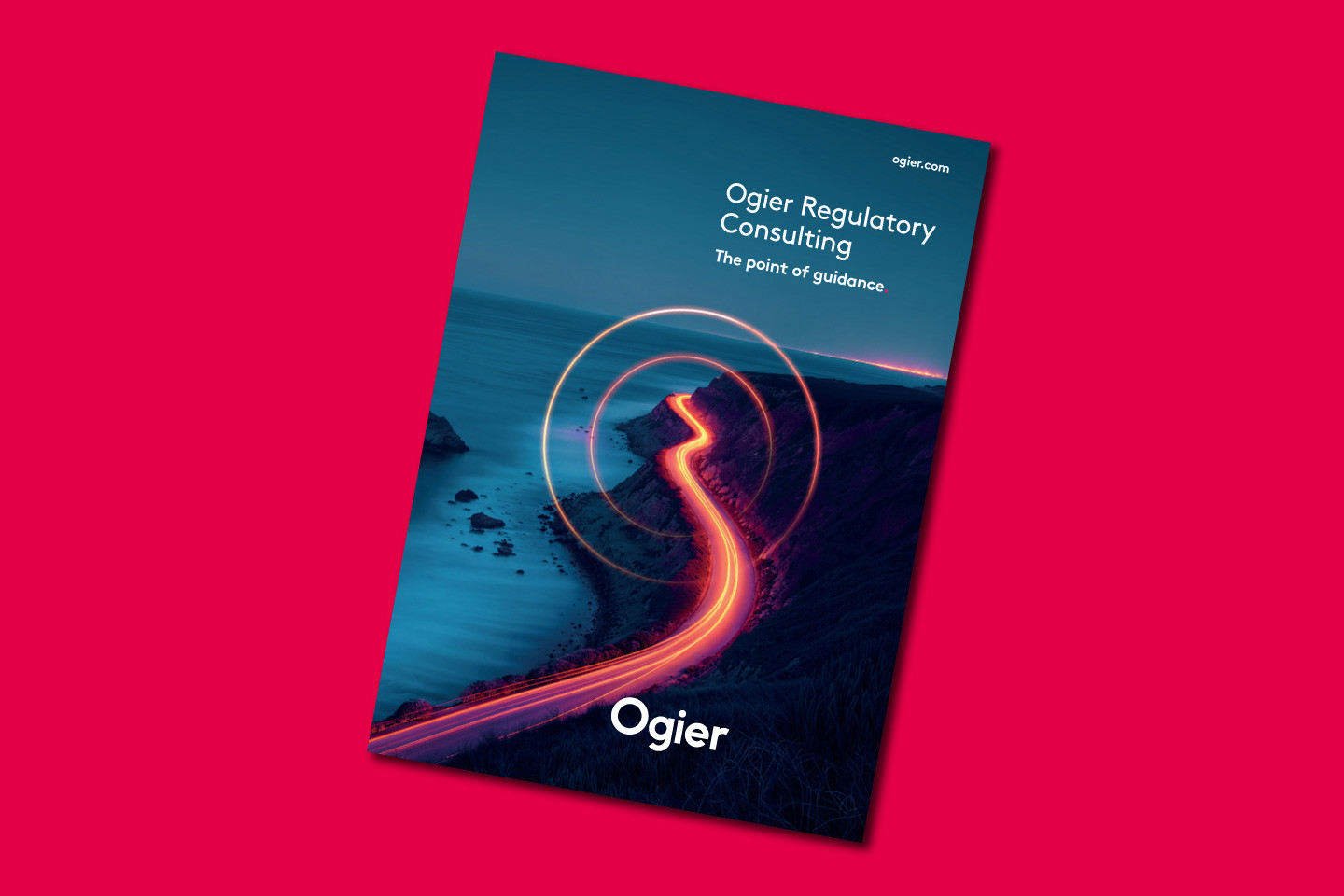 Ogier Regulatory Consulting brochure cover with illuminated winding coastal road at night, Ogier logo overlaid 