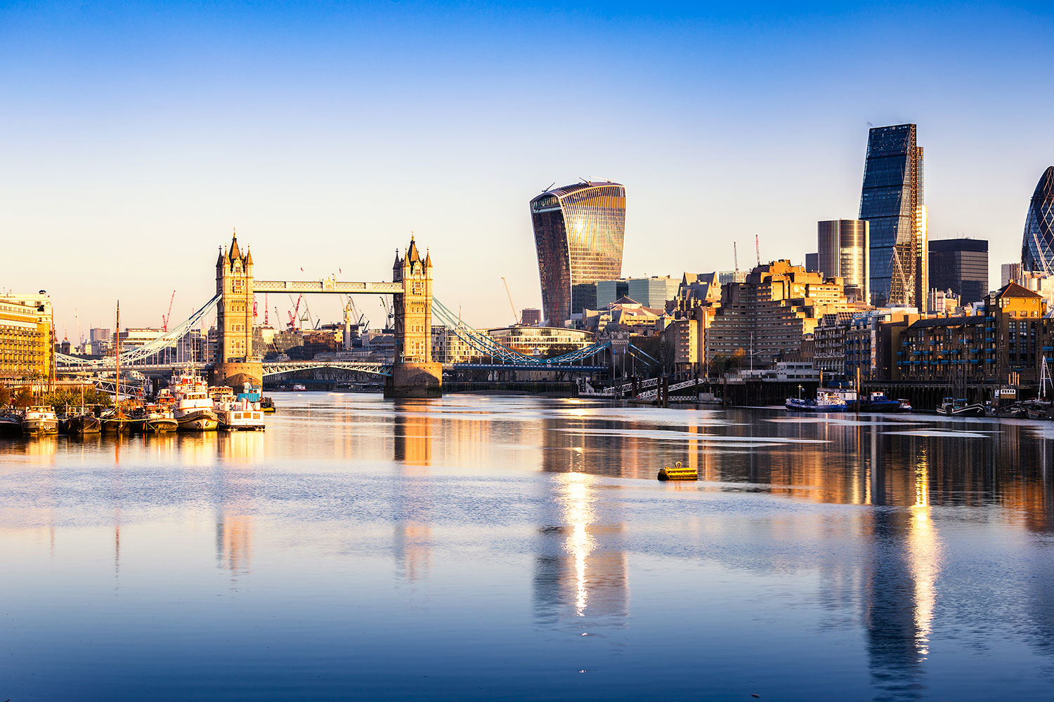 river Thames view of London skyline including London Bridge